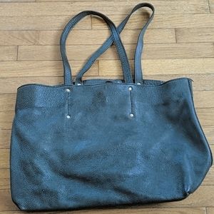 Roots leather bag